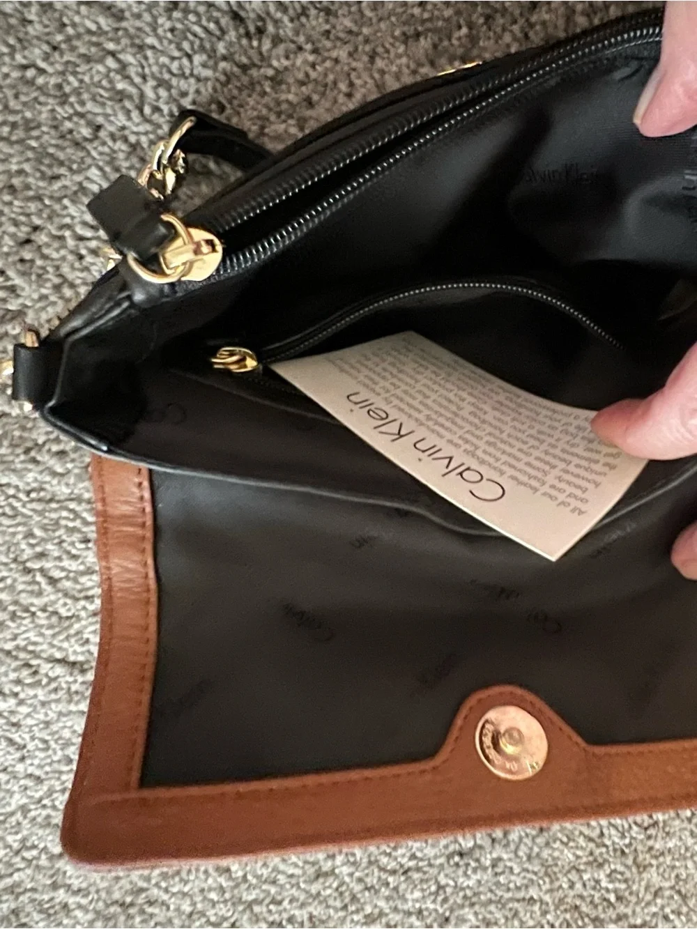Calvin Klein Two-Tone Black and Brown Leather Crossbody with Gold Lock
